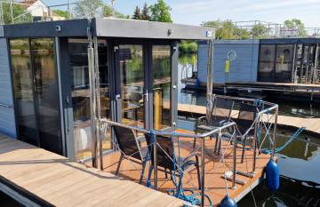 Festliegende Wohnboote Marina Niederhavel - Foto 3