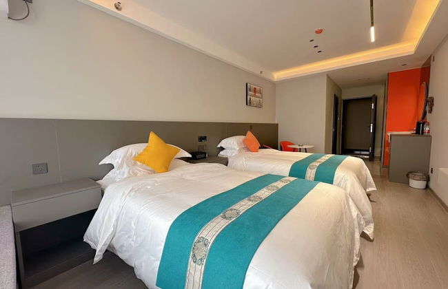 Qin Mengli Hotel - Photo 11