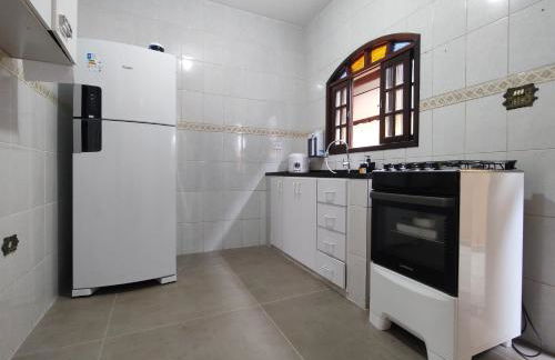 Casa piscina com ozônio churrasqueira perto da praia - Foto 6