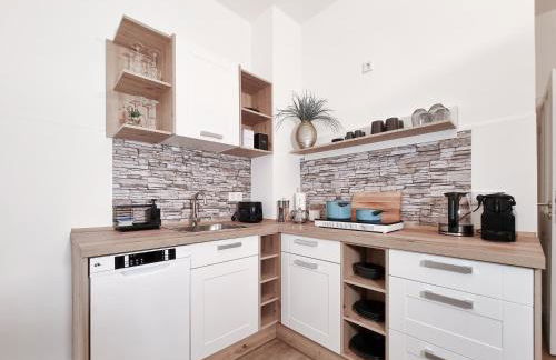 Alpha Apartments - Photo 9