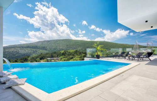 Villa Top Hill, heated infinity pool, Jacuzzi, Sauna, 5 en-suite bedrooms, a Media room - Foto 7