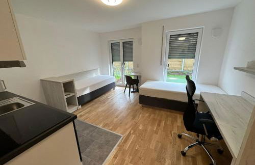 1 Zimmer Studioapartment mit bis zu 2 Einzelbetten in der Land of Living - Foto 1