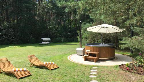 Deluxe Holiday Zdrojowa -Willa typu Alpejskiego w Borach Tucholskich-Całoroczna Balia z jacuzzi-Prywatny las i strumyk -Duża Wiata grillowa - Foto 5