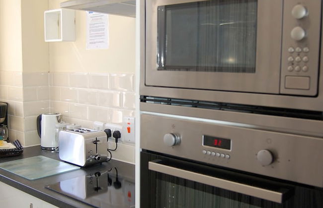 CLOCK TOWER APARTMENTS - Photo 15