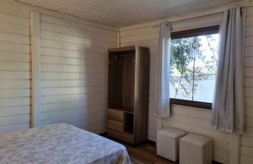 Casa 4 dorms 2 suites - localização perfeita no centrinho e rodeada de natureza - Foto 14