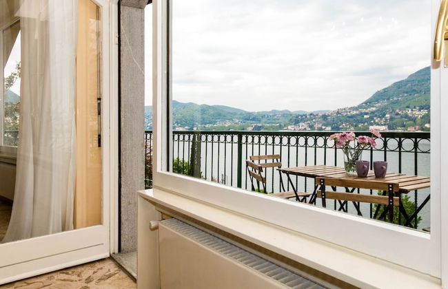 JOIVY Garden Oasis: 1BR Apt w/ Balcony & Parking - Foto 10