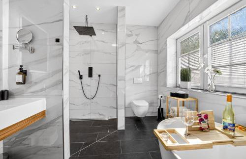 JUNIPRO Luxury Apartments - Photo 40