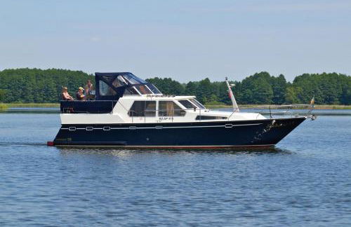 Boats & Yachts at Rechlin Harbor by Kuhnle-Tours - Photo 1