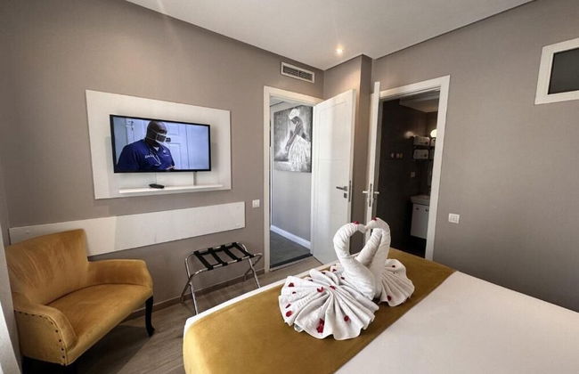 Rent Inn Suites - Foto 19