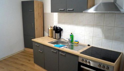 Gemütliche Wohnung direkt am Bahnhof perfekte Lage - Foto 2, stove