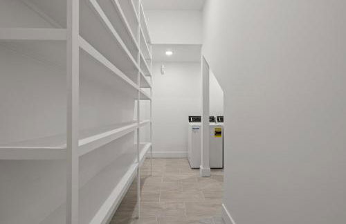 Brand NEW Expansive Coastal Home w/ Custom Furnishings Sleeps 15 - Photo 52