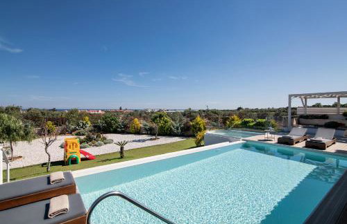 Alba Bianca Villa, Family Retreat with Heated Pool By ThinkVilla - Foto 9