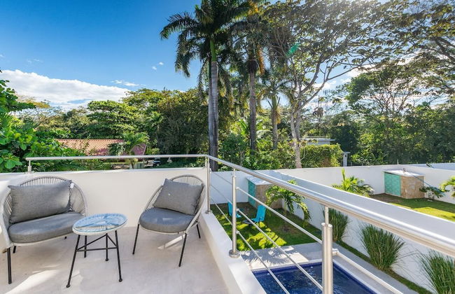 Ultramodern Townhome with an Inviting Coastal Design and Lush Outdoor Oasis with a Private Pool - Photo 18