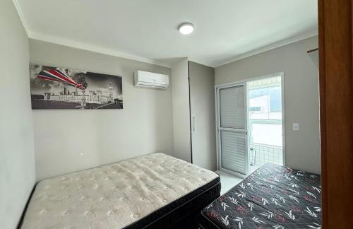 Apartamento Vista Mar Mirim 2 Dormitorios suite com Wifi para até 8 pessoas 1 vaga de estacionamento - Foto 9