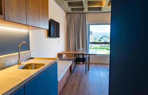 Atrium Studios by Xtay - Studio moderno em Pedra Branca - Caminhe até o Centro Empresarial e Unisul - Foto 31