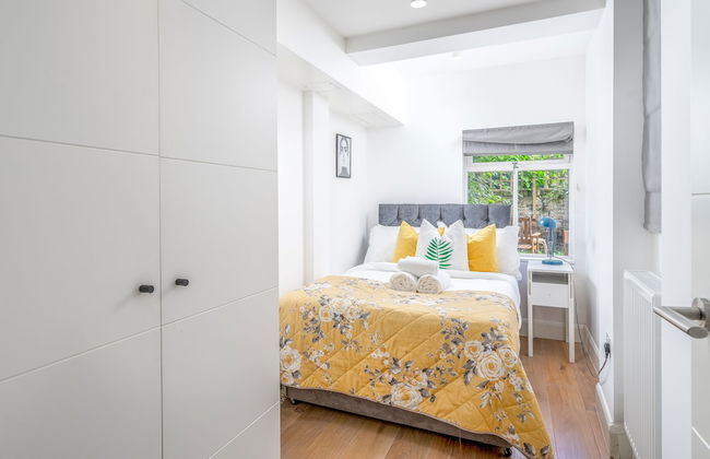 JOIVY Stylish 2-Bed Flat W/ Private Garden In Notting Hill, - Foto 1