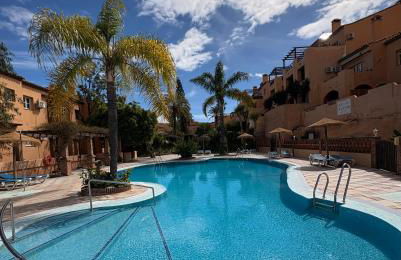 Riviera Del Sol Apartment - Photo 1