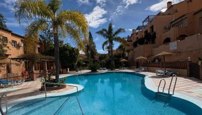 Riviera Del Sol Apartment - Photo 1