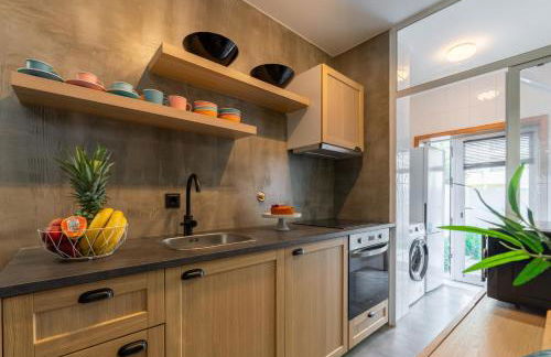 HostWise – Modern Flat w/ Terrace | Near the Beach - Photo 3