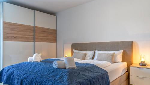 Lüftenblick - 2 Ferienwohnungen am Starnberger See, mit Terrasse oder Balkon, Weitblick, Sauna, Kamin, E-Ladestation - Foto 5, towels, wardrobe