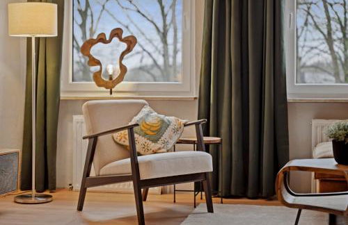 MAISUITES Sperling - Zentrale Ferienwohnung mit Boxspringbett, Kaffeevollautomat, WLAN & seitlichem Seeblick - Foto 13