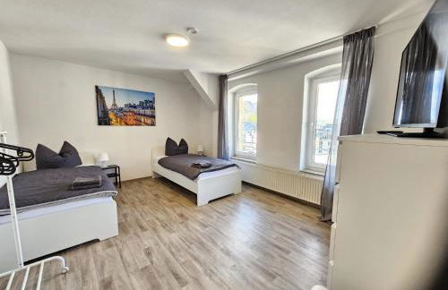 MR Living I moderne Apartments mit Einzelbetten, voll ausgestattete Küche, WLAN, Parkplatz, ideal für Monteure I DI01, DI02 - Foto 1