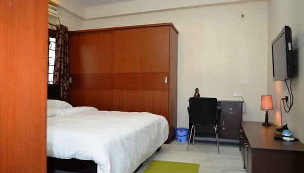 Falcons Nest Gachibowli - Foto 4, Habitación