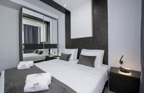 TWIN'S HOME LUXURY SUITES - Photo 2