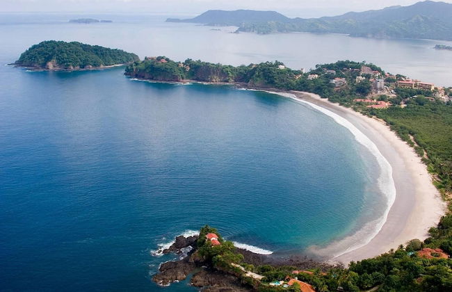 Beachfront Condo with Warm, Rustic Interiors & Direct Access to Playa Flamingo - Photo 26