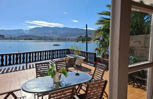 Casa de madera sobre el mar - Foto 10