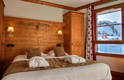 ARC 1950 - Appartement 10 personnes Duplex Cheminée - ski aux pieds - Sauna, Hammam, Jacuzzi - Photo 6