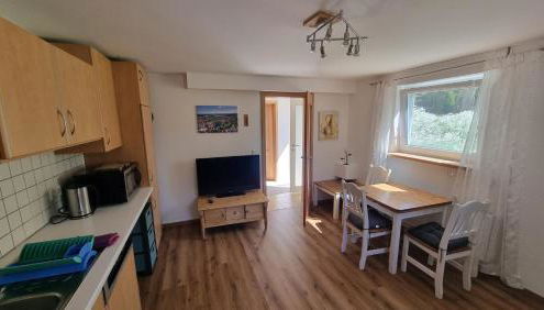 Souterrain Apartment mit Gartenblick - Foto 2