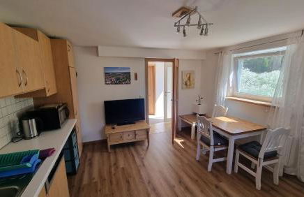 Souterrain Apartment mit Gartenblick - Foto 2