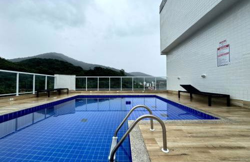 Apartamento novo a 350 m da praia das Toninhas em Ubatuba - 2 dormitórios sendo 1 suite, piscina, varanda gourmet com churrasqueira, ar condicionado, cozinha completa, garagem privativa - Foto 32