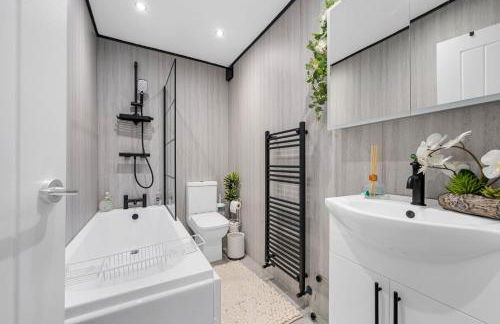 SLUXE Properties 4mins to Etihad Stadium and Coop live - Foto 35