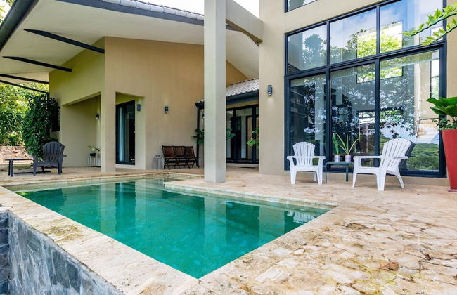 Nostalgic Retro Home on Luxurious Lot with a Private Infinity Pool and Ocean Views - Photo 1