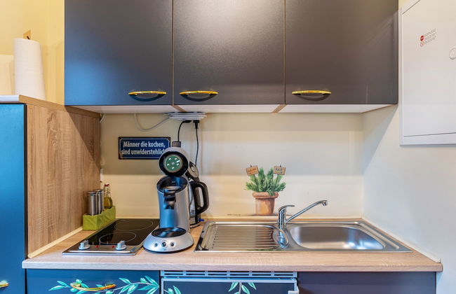 SCHUSTERjunge APARTHOTEL - Photo 18