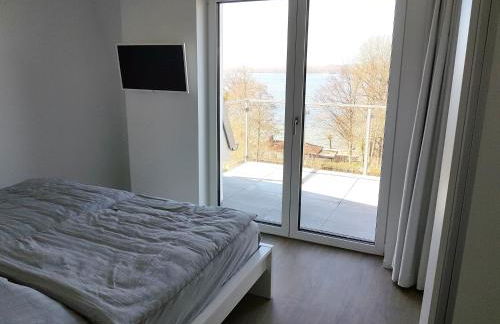 Neubau-Ferienwohnung mit Panorama-Seeblick - Foto 13