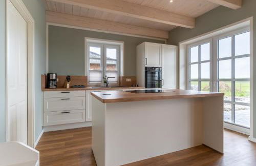 Doppelhaushalfte in Karolinenkoog - Foto 22