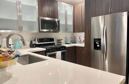 Lux One Bedroom Condo with Garden View - Photo 7