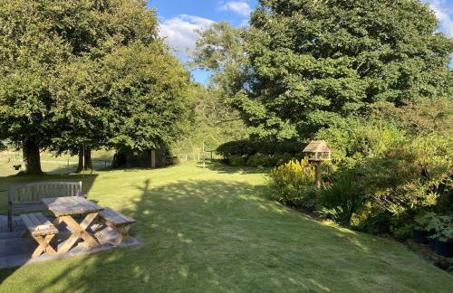 Houghton Park Holiday Cottage - Foto 1