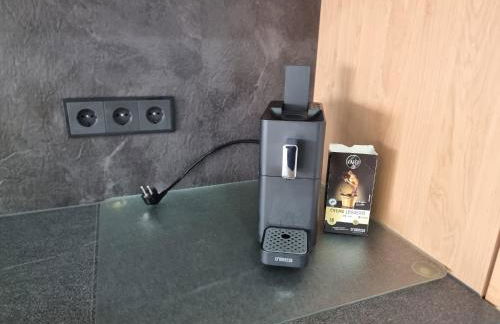 Gemütliche Ferienwohnung mit 1 Schlafzimmer, Wohnzimmer mit Schlafcouch & voll ausgestattete Küche - Foto 12