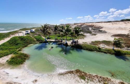 Duplex de 2 quartos com ar condicionado , piscina e estacionamento - Foto 2