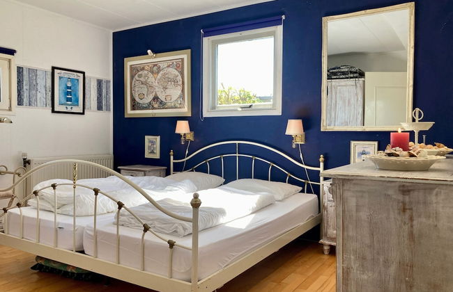 6 Pers House Marijke With Winter Garden and Direct Access to the Lauwersmeer - Foto 3