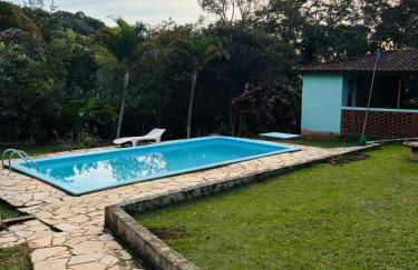 Casa de campo com piscina em condomínio. - Foto 1