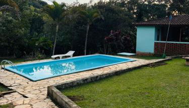Casa de campo com piscina em condomínio. - Foto 1
