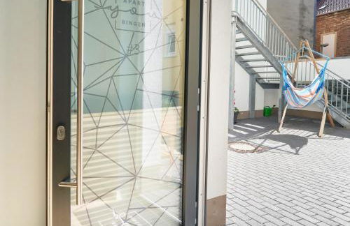 Design Apartment mit kostenfreiem Garagen Parkplatz im Zentrum - Foto 11