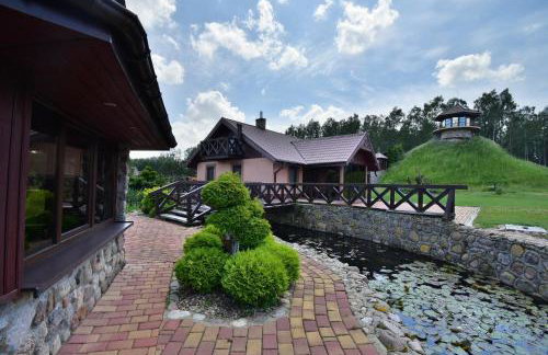 Dom nad stawem przy lesie - Foto 35