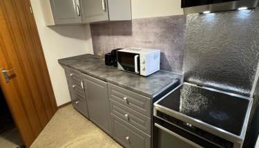 70qm Apartment mit Stellplatz und Garten - Foto 5, stove, dishwasher