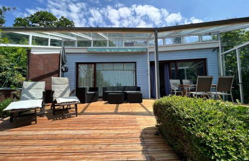 Ferienhaus Wellnesshütte mit Außenwhirlpool und herrlichem See-und Alpenblick - Foto 5